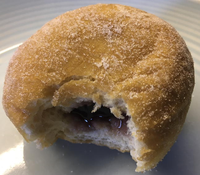 jam donut with bite taken